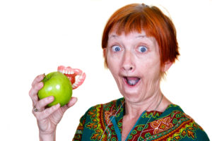 Elderly woman shocked her dentures came out when eating an apple